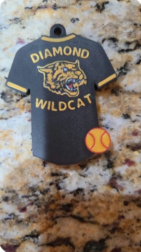 3D-printed Diamond Wildcats softball jersey keychain in team colors